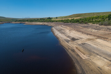 Baitings Reservoir near Ripponden, West Yorkshire, part of Yorkshire Water's series of reservoirs. Drought conditions across England causing depleted water levels.