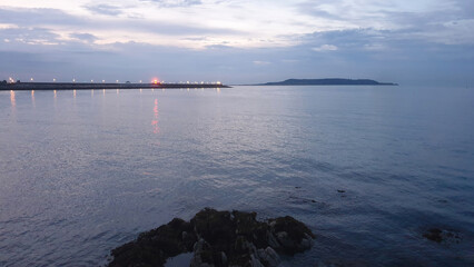 Dún Laoghaire East Pier as seen from the coastline.