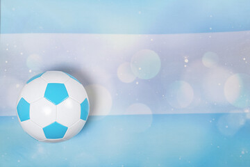FONDO BANDERA ARGENTINA Y PELOTA DE FUTBOL. HORIZONTAL. COLOR. © BARLOP