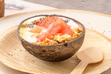 Yogurt with grapefruit, granola, chia and honey