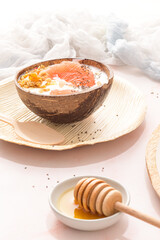 Yogurt with grapefruit, granola, chia and honey