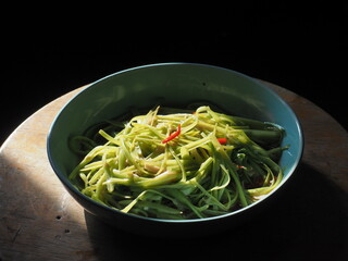stir fried morning glory vegetable with garlic and chili