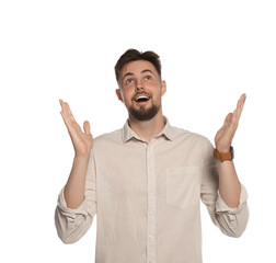 Fototapeta premium Handsome young man gesturing on white background