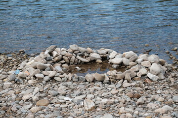 Rocks along the river formed in a circle