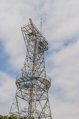 Radar tower at lighthouse complex in Ulsan South Korea under cloudy sky.