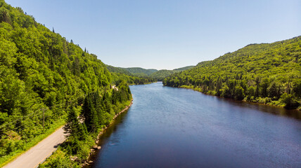 Fototapeta na wymiar Aerial photo of a river flowing through a national park