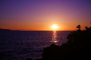 Fototapeta na wymiar Beautiful Sun down, Sunset at Beach in Ishigaki-jima Island, Okinawa, Japan - 日本 沖縄 石垣島 琉球観音埼灯台 海 夕日