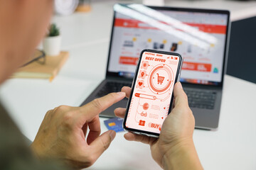 Hands holding credit card and using laptop. Online shopping, Order Online payment,Man's hands holding a credit card and using smart phone for online shopping. Promotion period