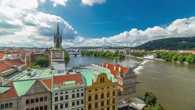 Staromestsky water tower timelapse in Prague, the Czech Republic. Top view from the Bridge tower. Cloudy sky at sunny day