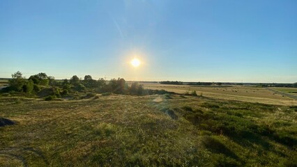 Fototapeta na wymiar cultivated fields before sunset in vicinity of Wlodawa