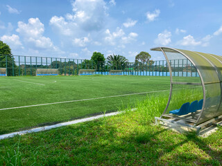 Super wide angle view of open spacious futsal field in HDB heartland in Singapore. Community...