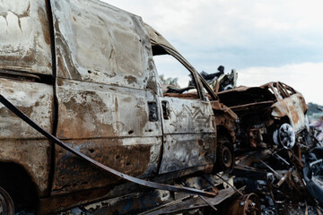 15.07.2022,Bucha War in Ukraine: a dump of shot and burned cars in Irpin, Bucha district
