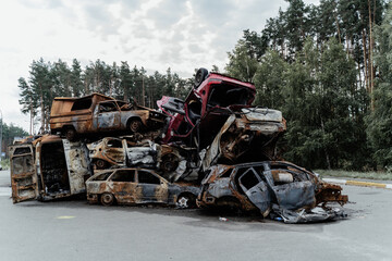 15.07.2022, Irpin War in Ukraine. Cars destroyed amid Russias attack on Ukraine are seen, after they were collected from different places, in Irpin, Kyiv region