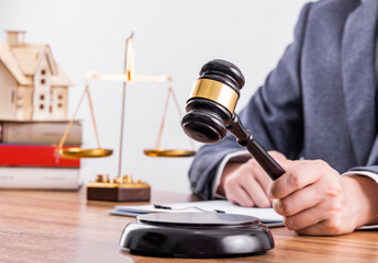 Judges hammer and legal advice figures on the table