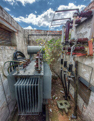 Disused and broken transformer in a ruin