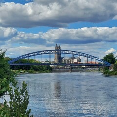 Fototapeta premium View to the city of Magdeburg, with the Sternbruecke (lit. star bridge) and the cathedral