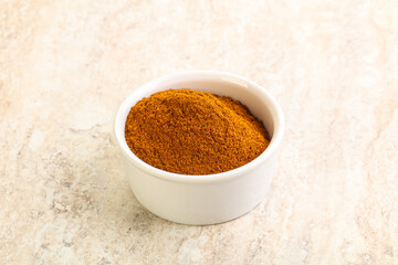Dry Paprika powder in the bowl