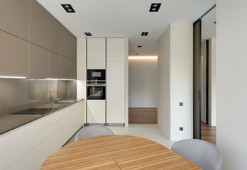 modern kitchen interior, kitchen with dining area in a modern light style