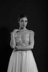 Fototapeta premium Portrait of woman in vintage dress in black and white