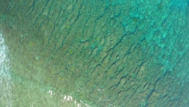 Aerial Top Forward Shot Of Nautical Vessels Floating On Wavy Sea - Suva, Fiji