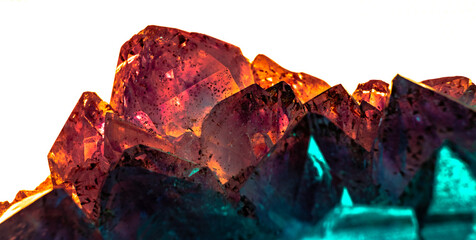 Closeup of a colourful crystal with clear white background
