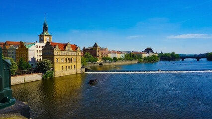 Fototapeta na wymiar View on city on Vltava river in Prague