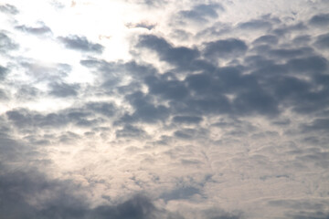 Sunlight background covered by black clouds in the afternoon