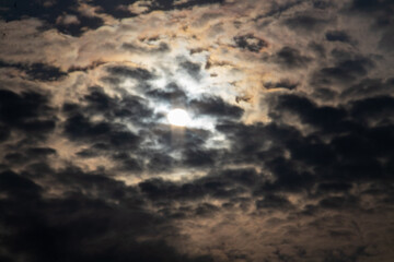 Sunlight background covered by black clouds in the afternoon