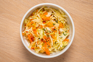 cabbage salad on the wooden background