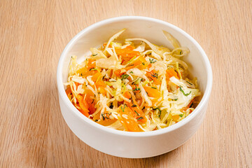 cabbage salad on the wooden background