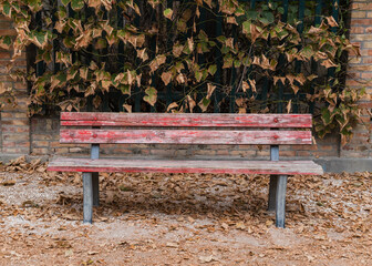 old worn out park bench in Italy