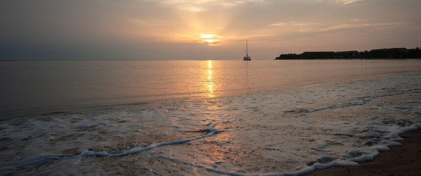 Sailboat anchored at the bay and scene of morning 