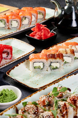 different rolls on beautiful plates with napkins top view composition