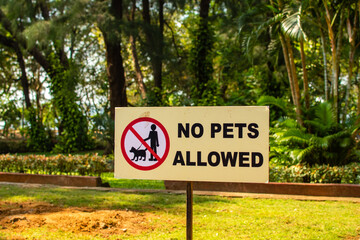 No pets allowed sign on gate in the park