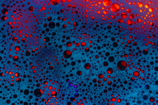 Abstract blue background. Colored soap foam texture. Gel foam with bubbles