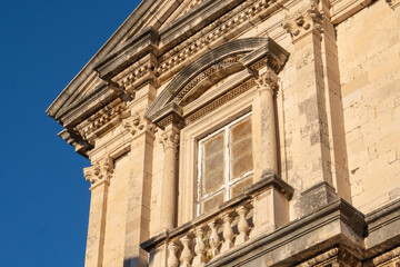 detail of the facade of the old building in Dubrovnik