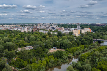 Fototapeta na wymiar Vistula River in Warsaw city, Poland, view with buildings in North Praga area