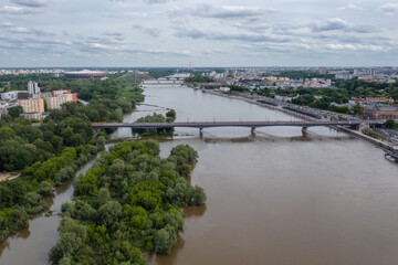 Fototapeta na wymiar Aerial view of Slasko-Dabrowski Bridge over Vistula River in Warsaw city, Poland