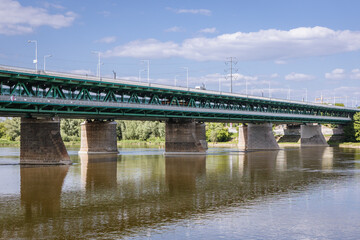 Fototapeta na wymiar Gdanski Bridge over Vistula River in Warsaw city, Poland