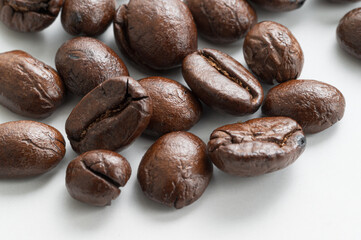 Coffee beans macro close-up, white background