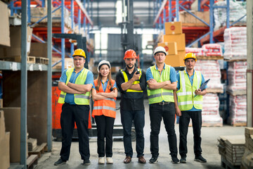 Group worker factory or engineer men and women standing with confidence and success. people working...