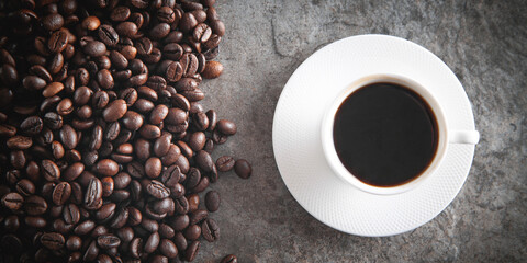 Cup of coffee and coffee beans.