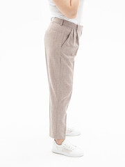 Natural linen trousers on white background. Women's summer trousers. Large size. Elastic-band trousers. Pants for summer. Side view