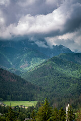 Fototapeta na wymiar Cloudy Mount Giewont in Tatras view from Zakopane, Poland