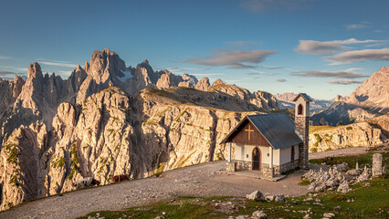 Fototapeta premium Small chapel and mountain trail to Tre Cime, Dolomites