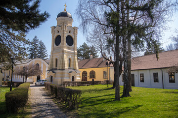 Fototapeta na wymiar Old church and temple of the Holy Trinity (Hram Svete Trojice). Beautiful view on belltower of orthodox church in the city of Kragujevac, Serbia 26.03.2022 