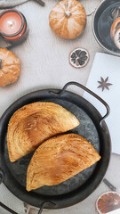 Karipap pusing or curry puff is one of Malaysian food which is made of several layers of crunchy skin with curry spiced potato filling and beef or chicken.