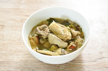 spicy boiled chicken with liver and gizzard Tom Yum Soup on bowl