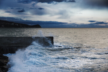 Storm at sea with waves during rain and cloudy in Alupka. Crimea