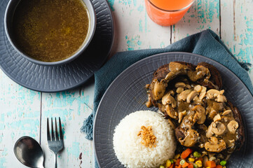 Bulalo Steak – is a famous Filipino dish where beef shanks are boiled then grilled topped with gravy mushroom sauce. 